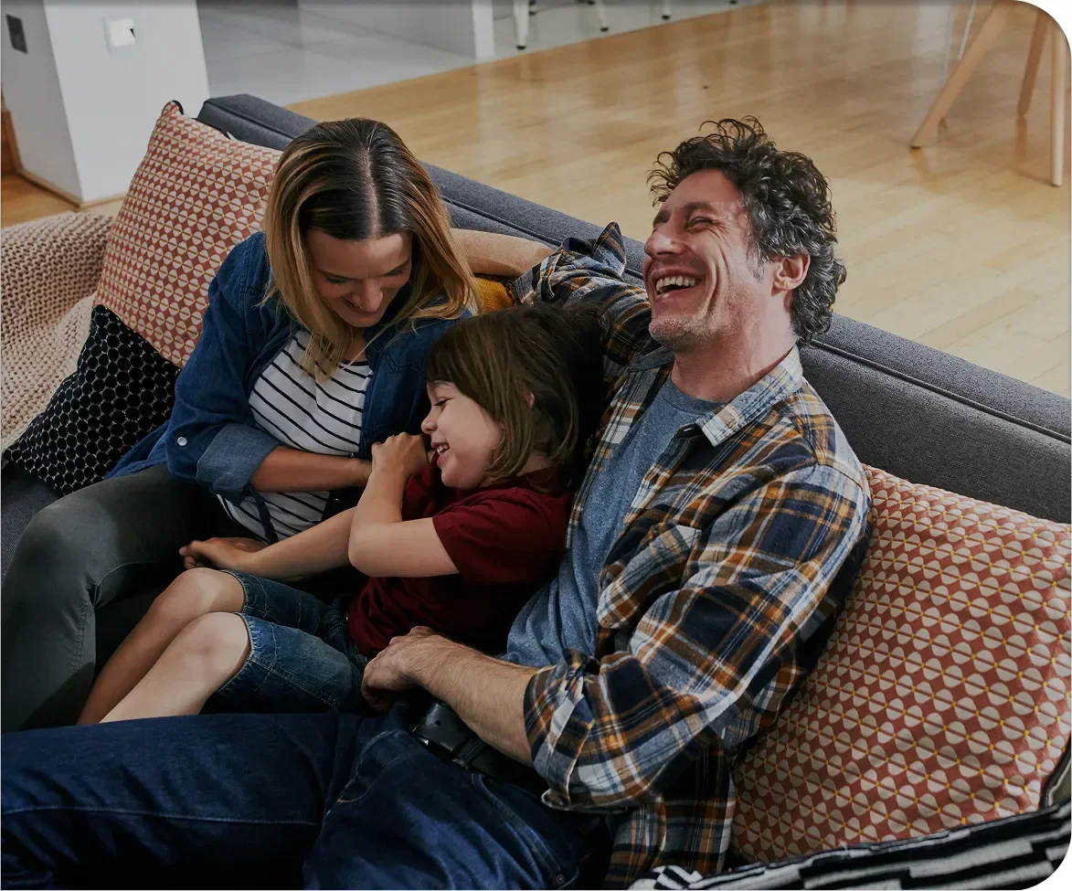 Familiy sofa laughing