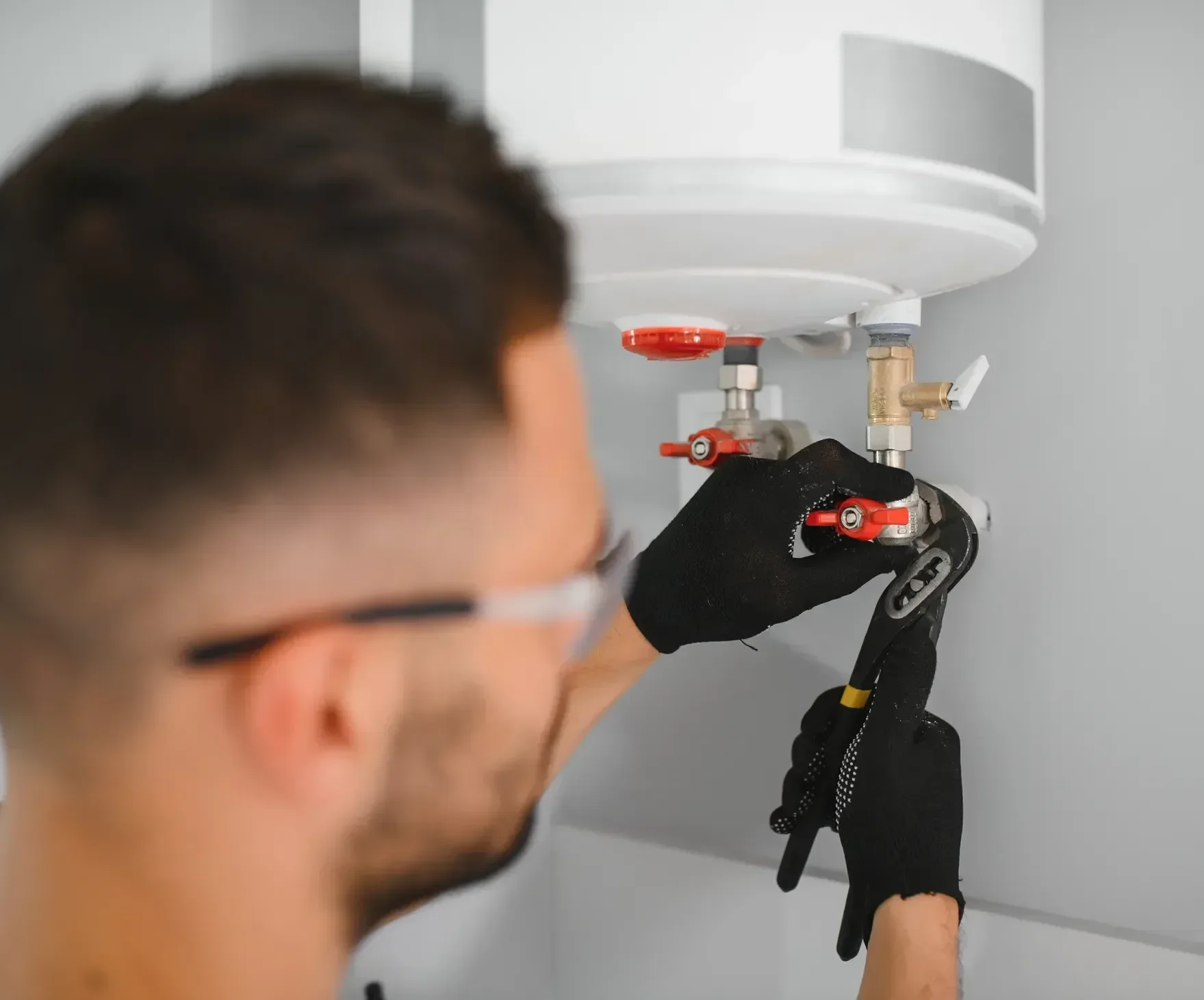 Professional plumber servicing a boiler 2026 01 09 06 51 41 utc
